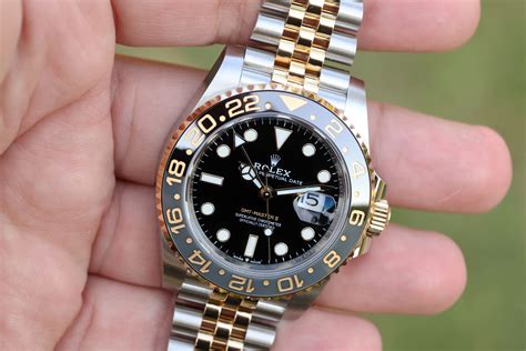 grey and balck Rolex